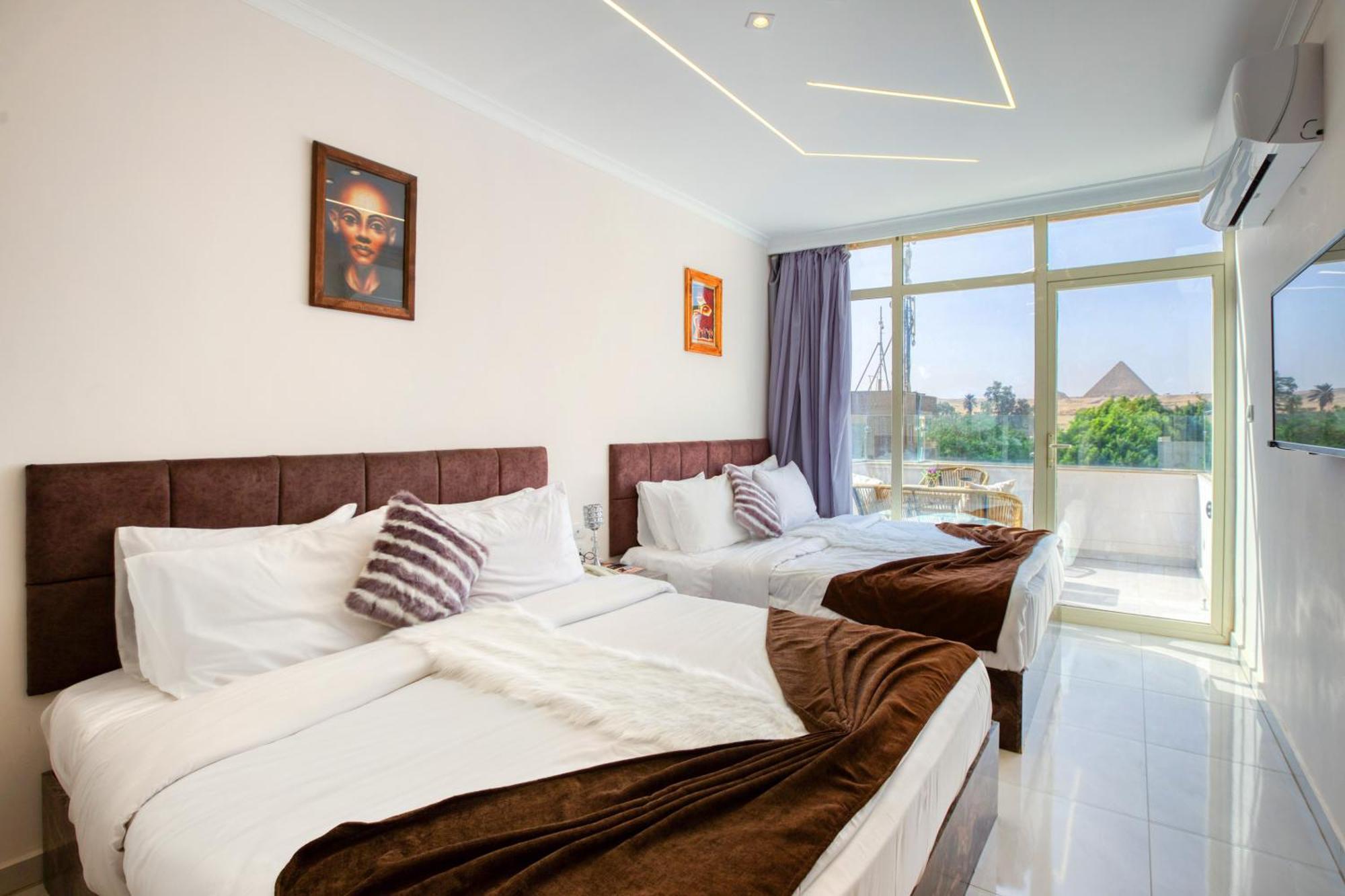 Tree Lounge Pyramids View Inn , Sphinx Giza Kafret el-Gabal 外观 照片